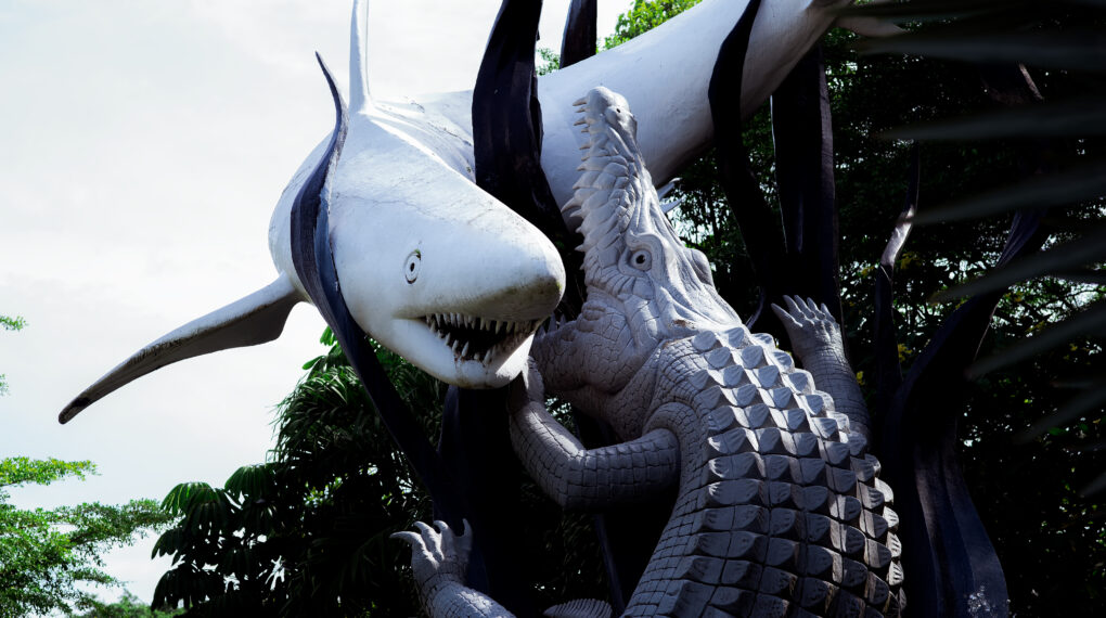 Statues of Suro and Boyo at the Surabaya Zoo. Crocodile and Shark City icon or landmark of the city of Surabaya