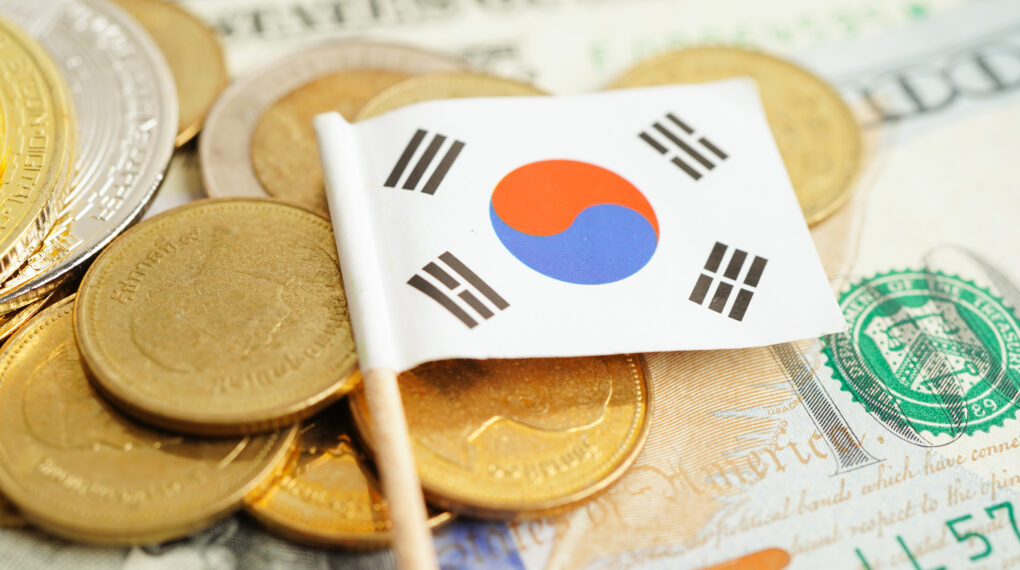 Stack of coins money with South Korea flag, finance banking concept