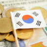 Stack of coins money with South Korea flag, finance banking concept